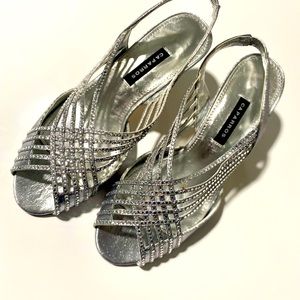 Silver high heels. No box, never worn.